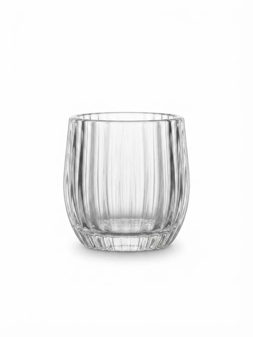 Glass candle holder with relief stripes