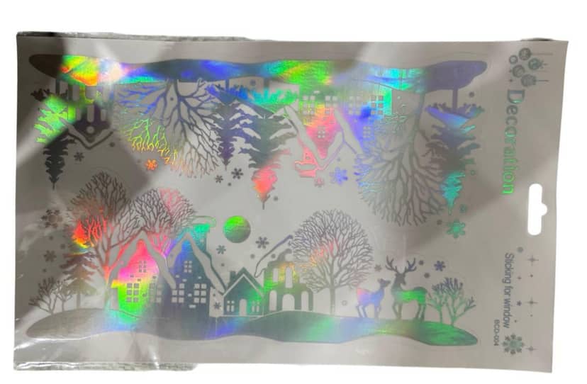 Holographic Silver New Year Stickers measuring 19x31 cm with diverse festive motifs on the package