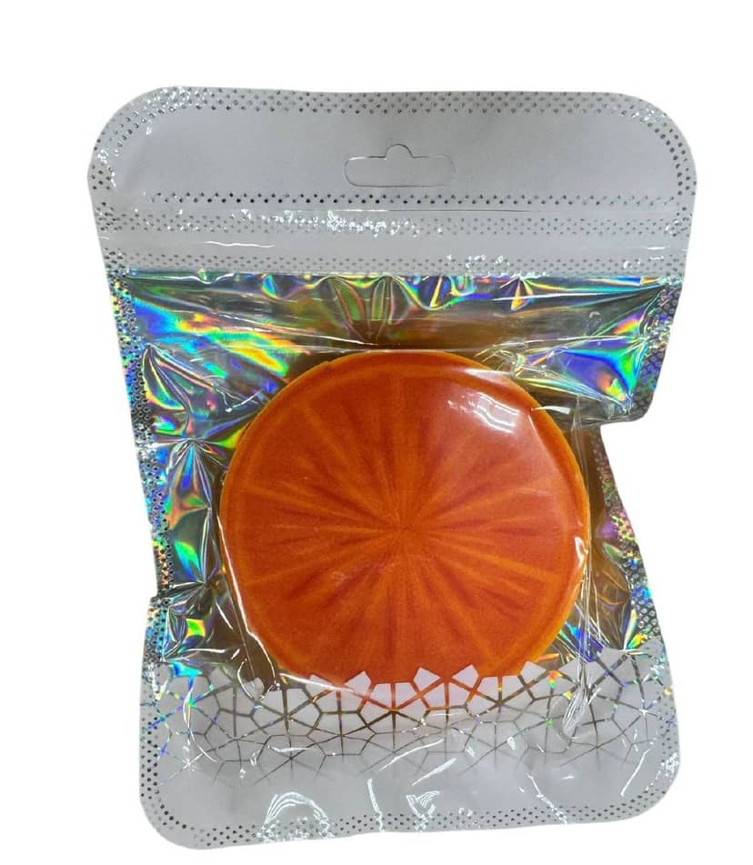 Round Sponge 6 Pieces Orange in glitter packaging on holographic background. Bright orange sponge