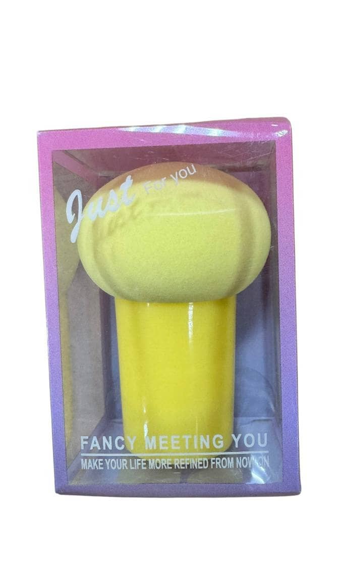 Yellow sponge with plastic handle and oval head in purple plastic packaging. Product 10382 designed